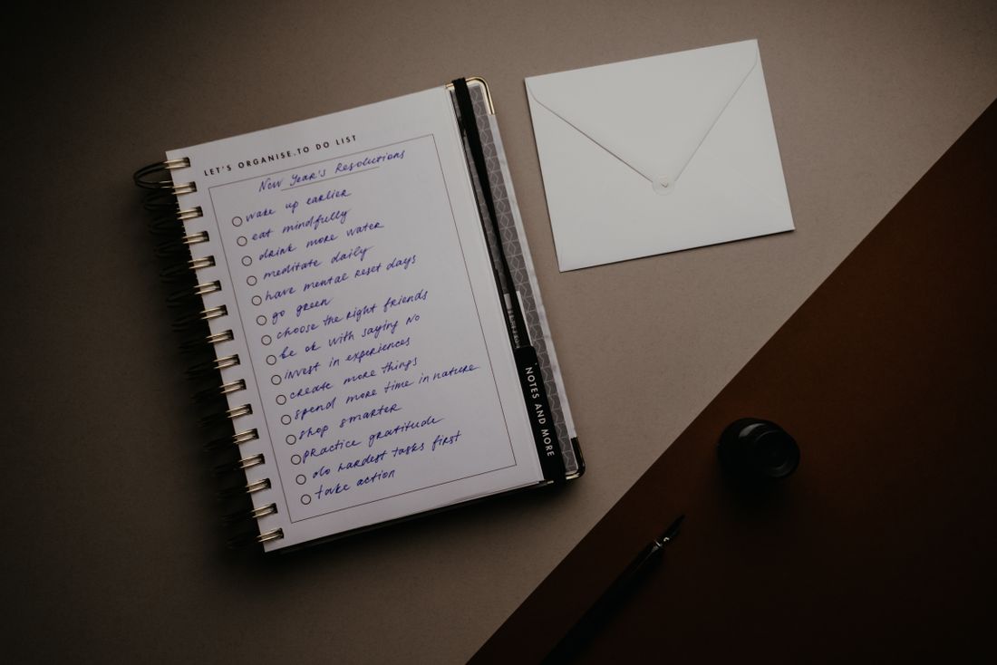 A paper planner and handwritten to-do list
